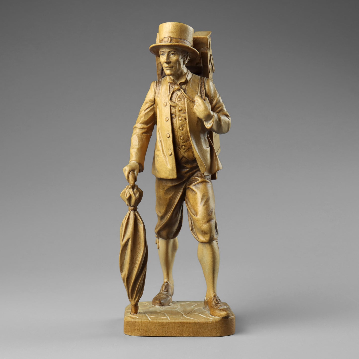 Carved Clock Peddler Statue