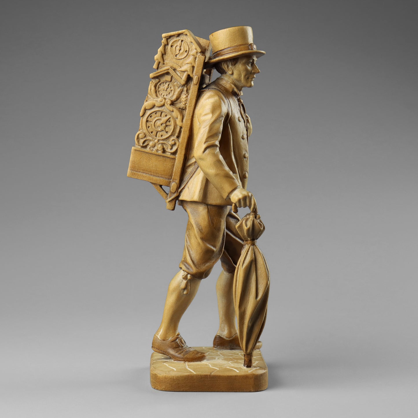 Carved Clock Peddler Statue