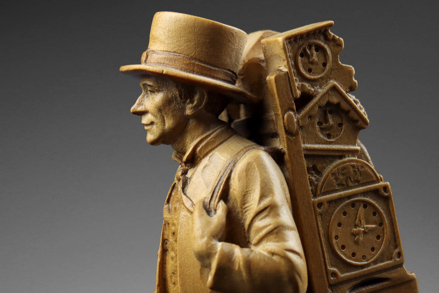 Carved Clock Peddler Statue