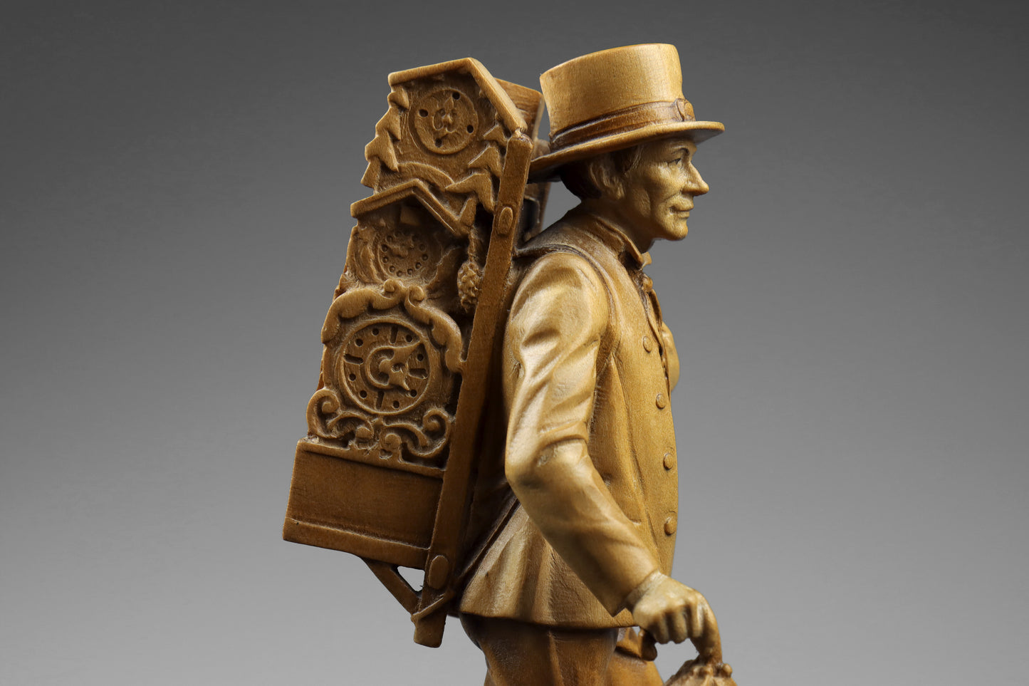 Carved Clock Peddler Statue