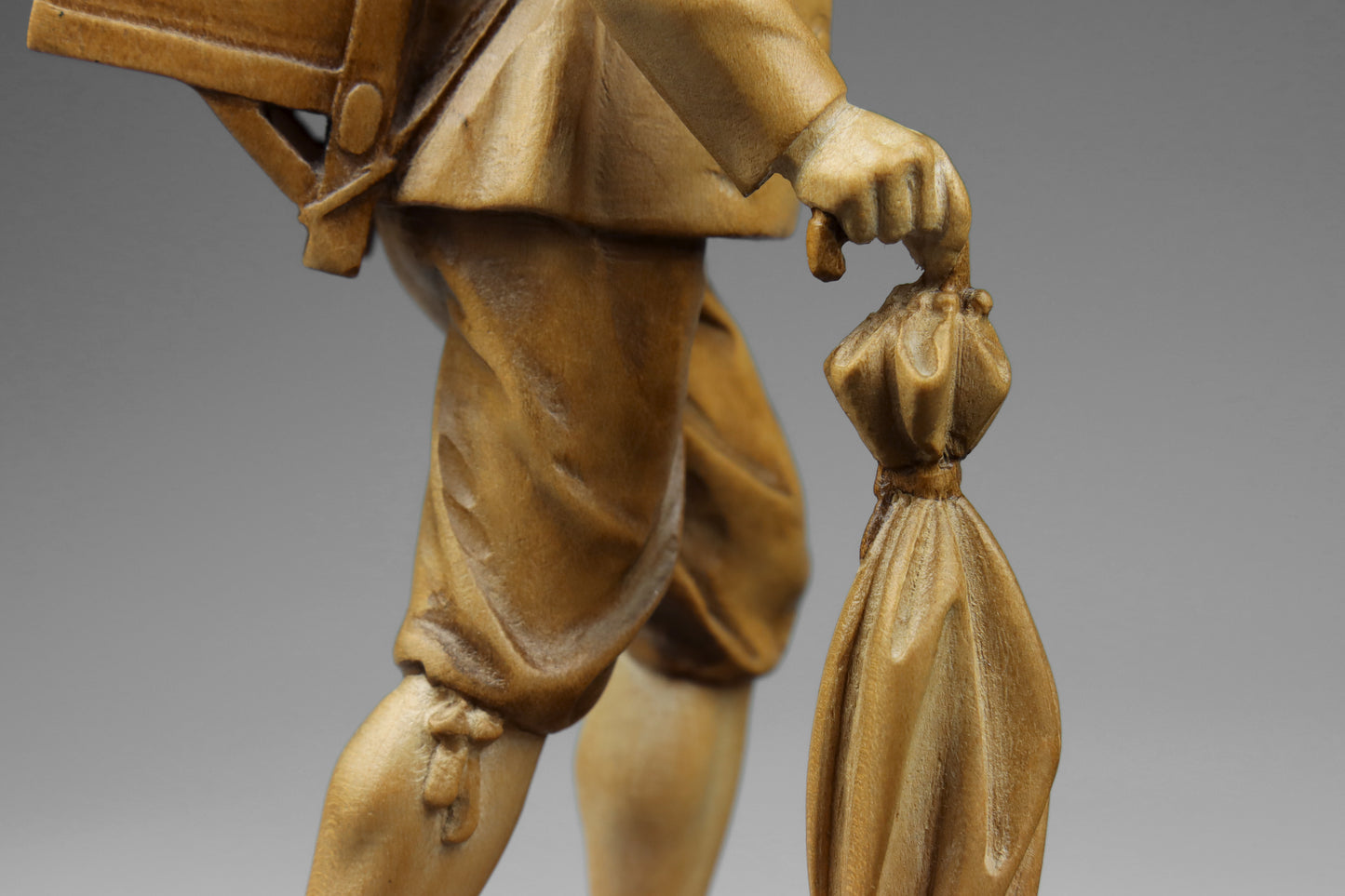 Carved Clock Peddler Statue