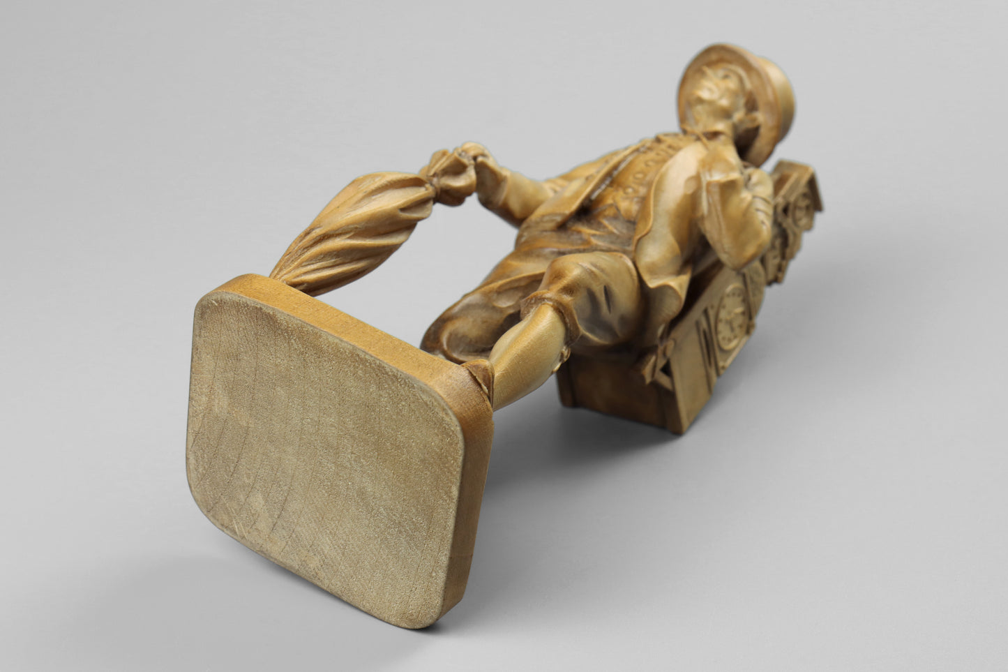 Carved Clock Peddler Statue