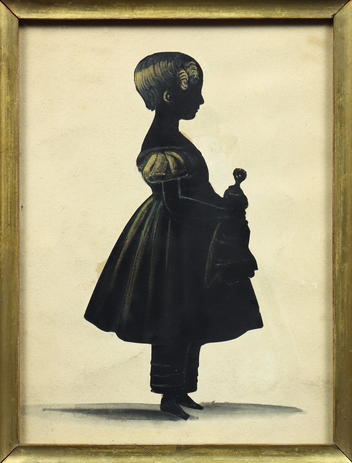 Cut Silhouette of a Girl With Doll