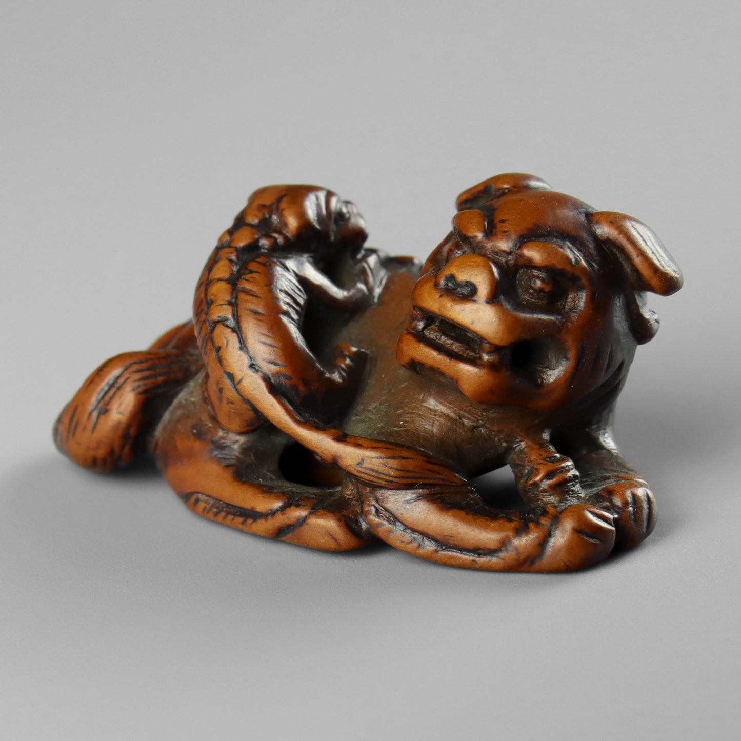 Netsuke of a Shishi & Cub